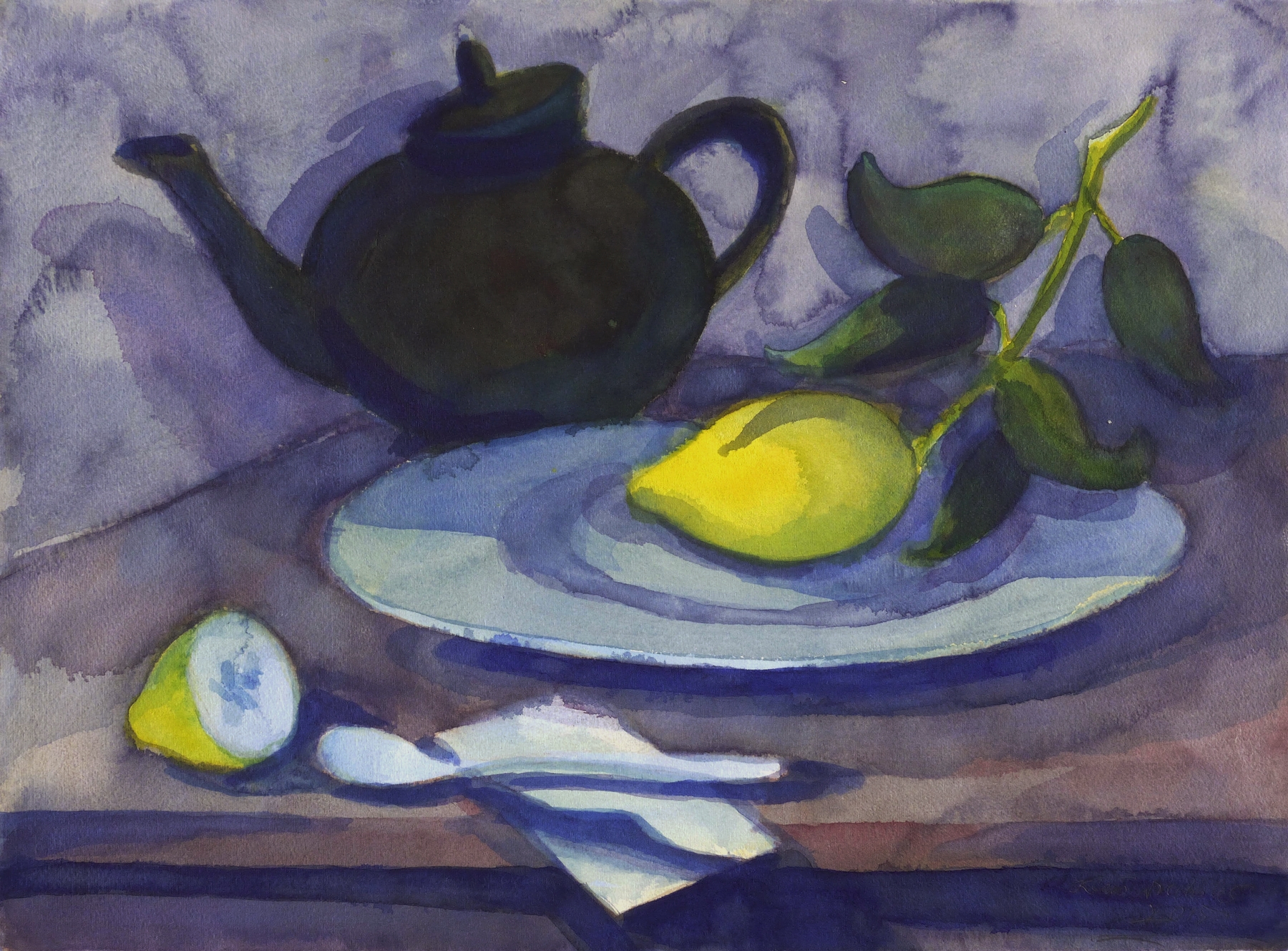 Schwarze Teekanne mit Zitronenzweig